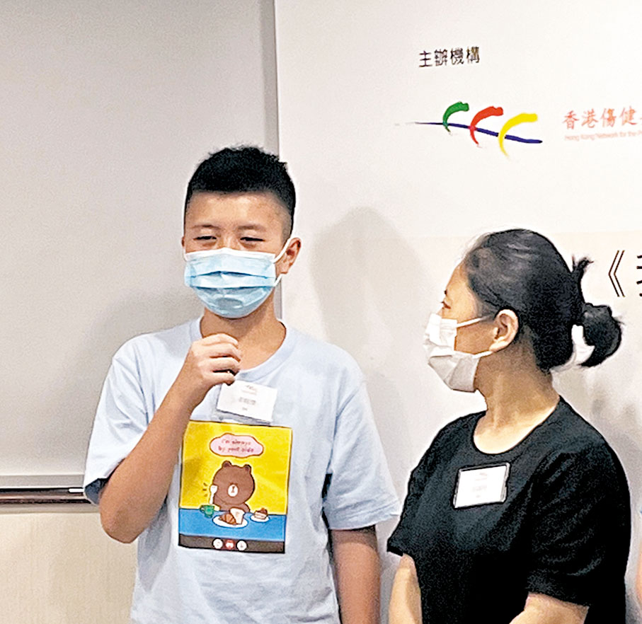 ◆田女士及其兒子。香港文匯報記者郭倩  攝