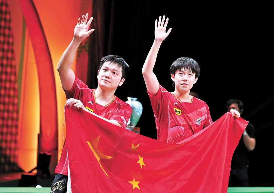 ◆樊振東/王楚欽（右）在男雙稱王。 新華社