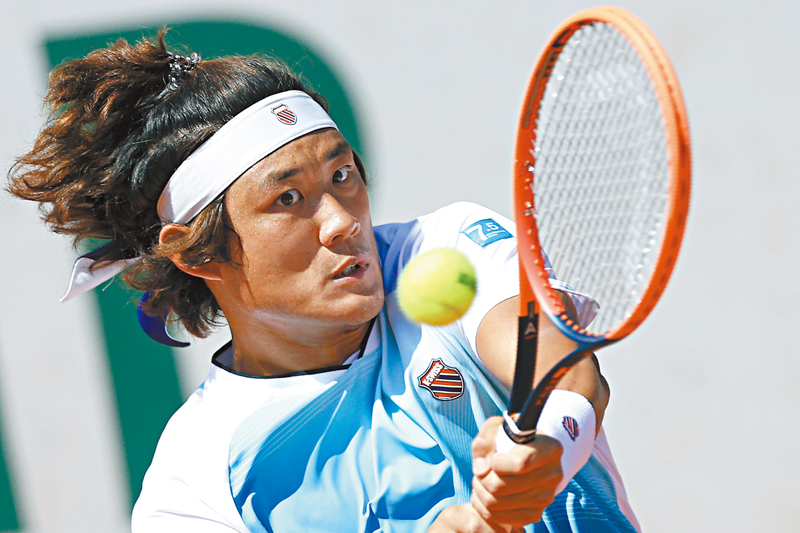 ◆張之臻成為公開賽時代首位晉法網男單32強的中國內地選手。 美聯社