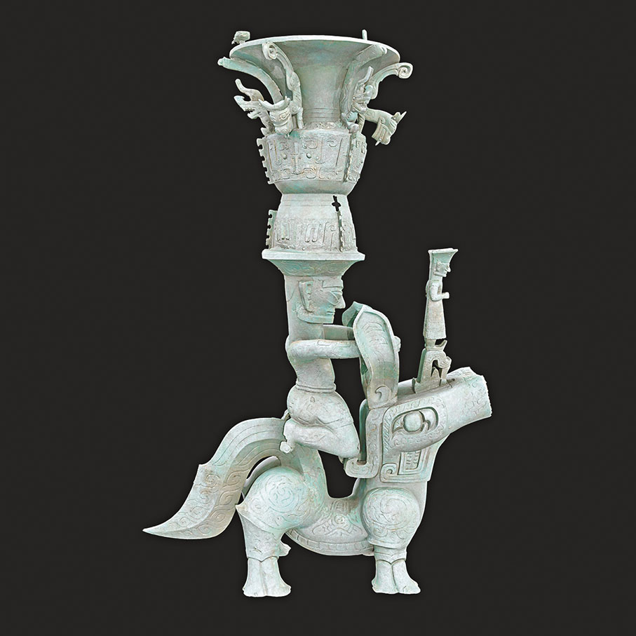 ◆銅獸馱跪坐人頂尊銅像。 中新社