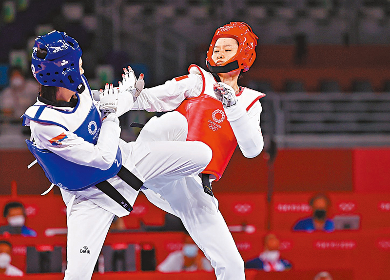 ◆中國跆拳道奧運冠軍吳靜鈺（右）將與對手在虛擬世界進行一對一對打。資料圖片