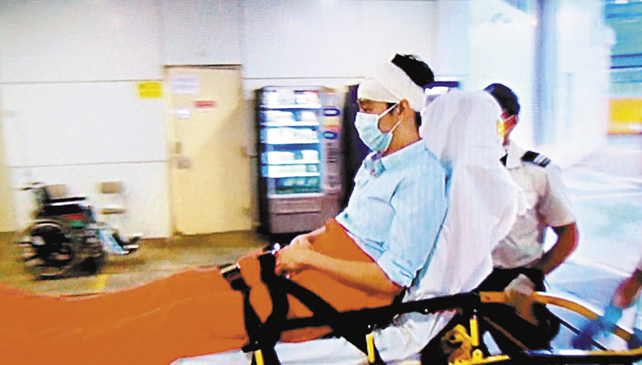 ◆石屎剝落事故中，遭墜下石屎擊中頭部受傷男子清醒，送院治理。