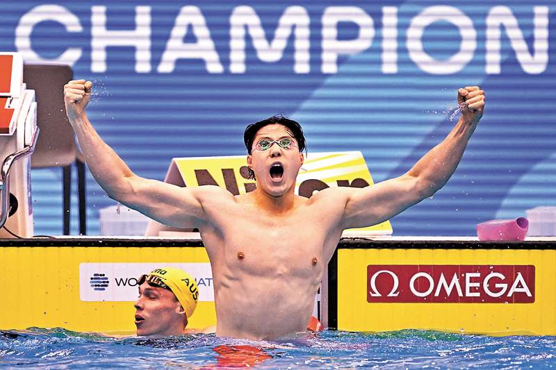 ◆覃海洋以破世界紀錄的成績奪得男子200米蛙泳金牌。法新社