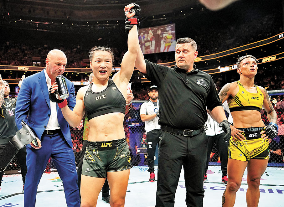 壓倒性優勢獲判擊敗巴西人萊莫斯 張偉麗成功衛冕UFC金腰帶 - 香港文匯報
