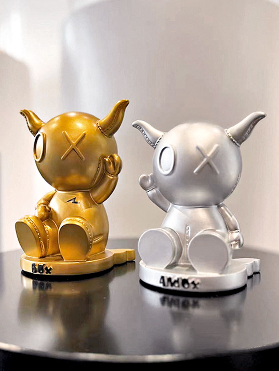 ◆劉德華為媽媽創作的公仔形象，保留了屬於自己的生肖「牛」。