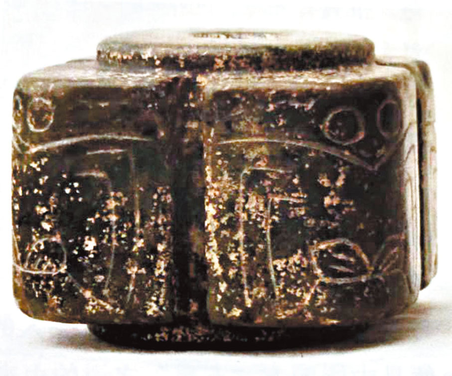 ◆圖四：刻鴞鳥紋玉琮。