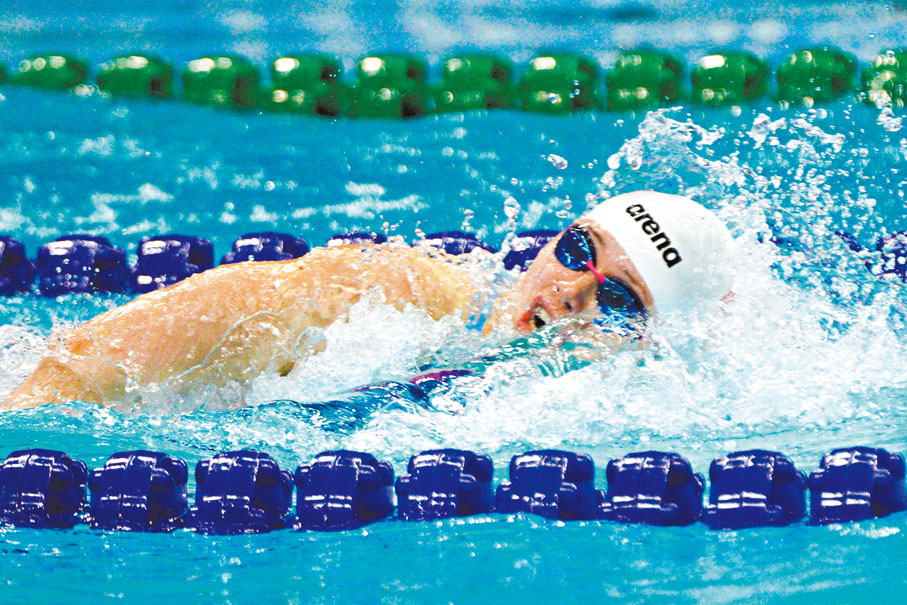 ◆何詩蓓於女子200米自由泳決賽輕鬆奪金。香港文匯報記者麥鈞傑  攝