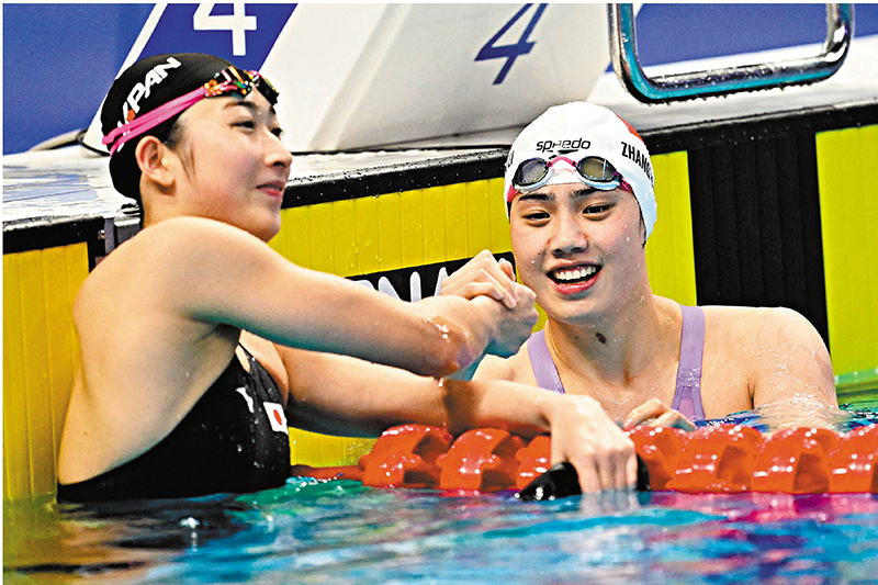 ◆張雨霏（右）今屆亞運共獲6面金牌。路透社