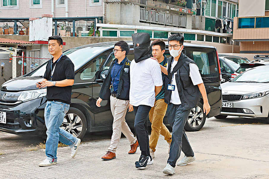 ◆警方拘捕無綫藝員鄭雋熹。 香港文匯報記者劉友光 攝