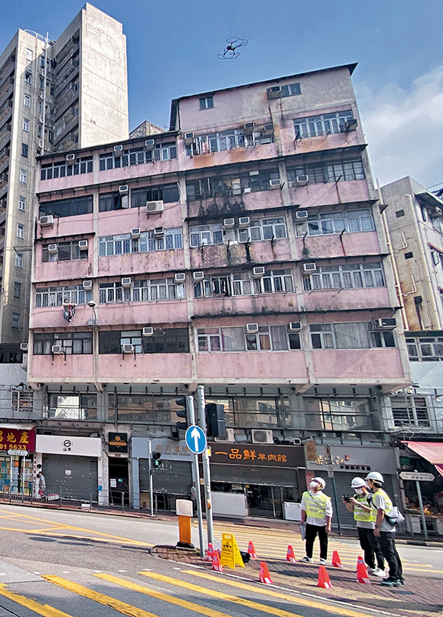 ◆屋宇署已開始以無人機為風險較高的樓宇外牆進行勘察。 資料圖片