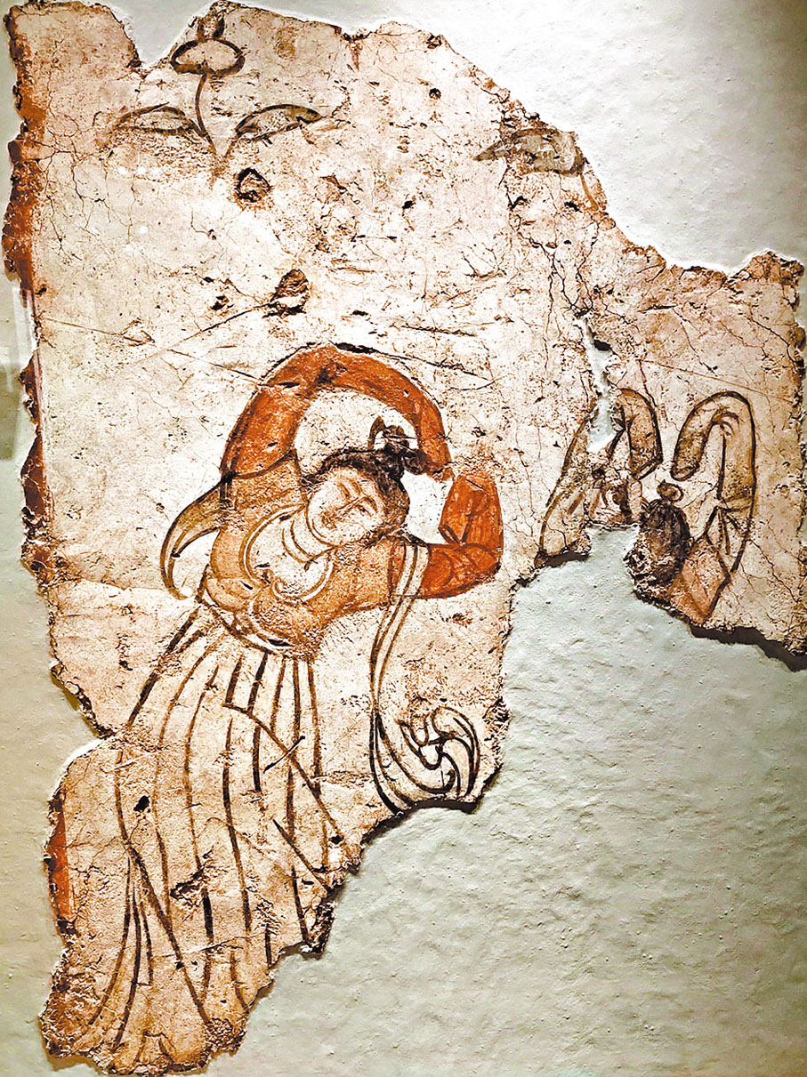 ◆翩翩起舞的唐代舞者，其雙手上環，恍若現今流行的「比心」姿勢。