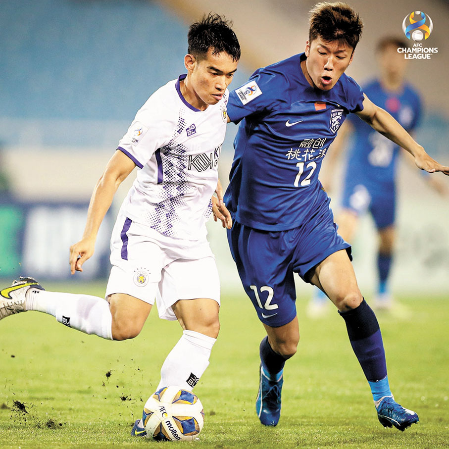 ◆武漢三鎮（藍衫）被越南河內以2：1逆轉。AFC圖片