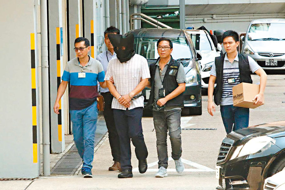 ◆2017年9月，許金山第二次被捕及被正式控以兩項謀殺罪。 資料圖片