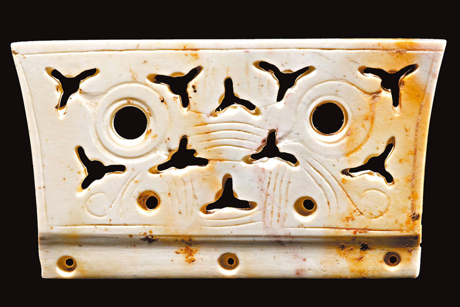 ◆良渚古城及水利系統遺址出土冠狀器。香港文匯報北京傳真