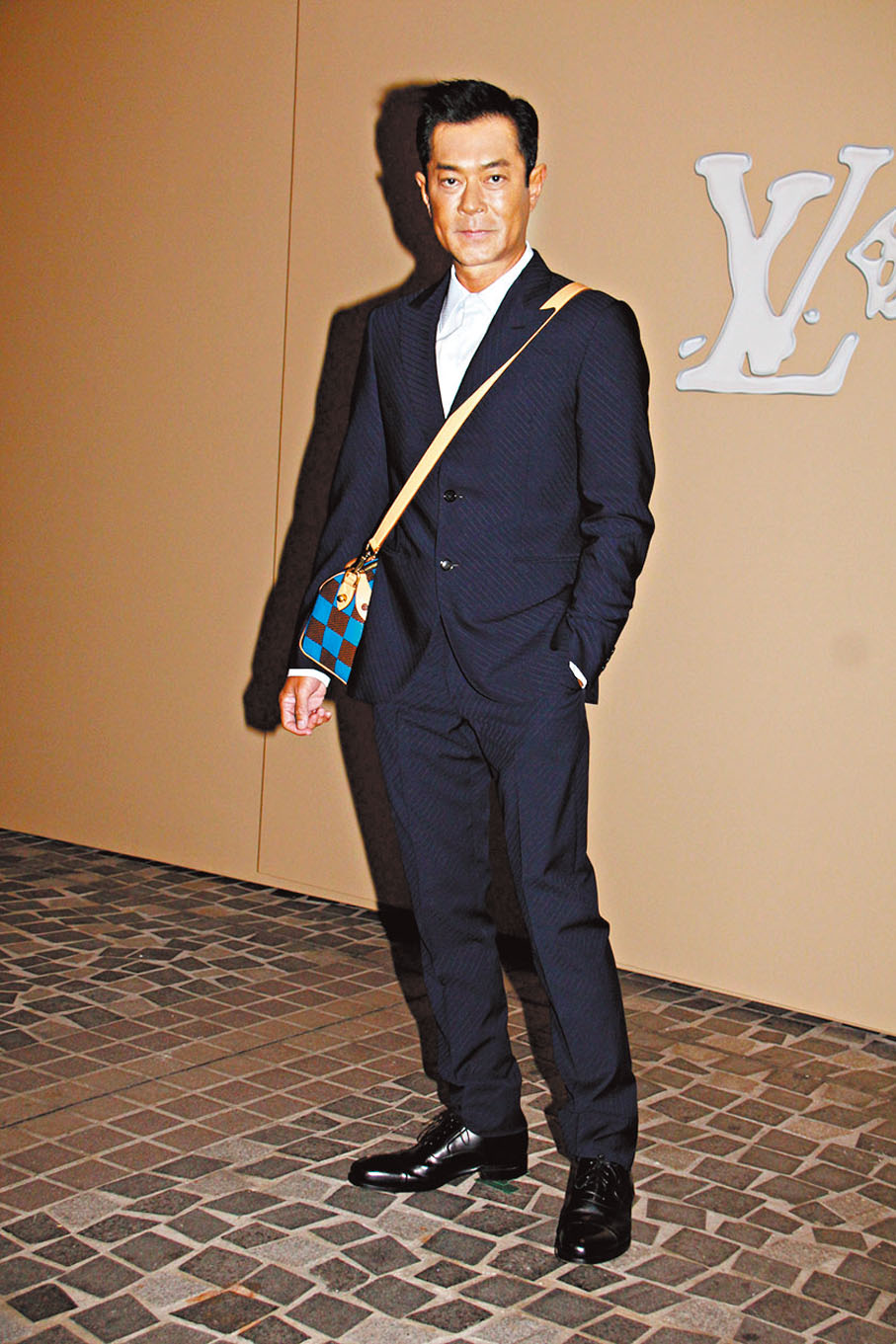 ◆古仔搭配最新款手袋出席活動。