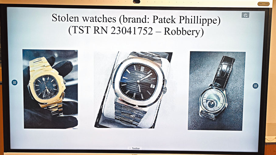 ◆警方展示被劫去的3隻百達翡麗名錶圖片。香港文匯報記者鄺福強 攝