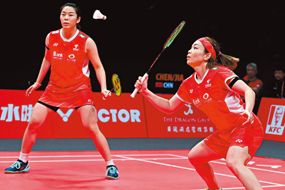 ◆陳清晨（右）/賈一凡在比賽中。 新華社
