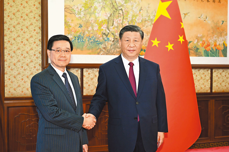 ◆國家主席習近平在12月18日於中南海會見來京述職的香港特別行政區行政長官李家超。   資料圖片