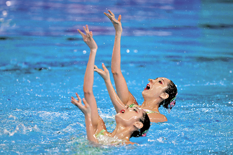 ◆王柳懿與王芊懿在女子雙人技術自選預賽暫居第一。 美聯社