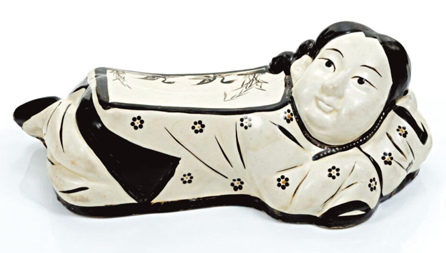 ◆白釉黑彩臥嬰枕