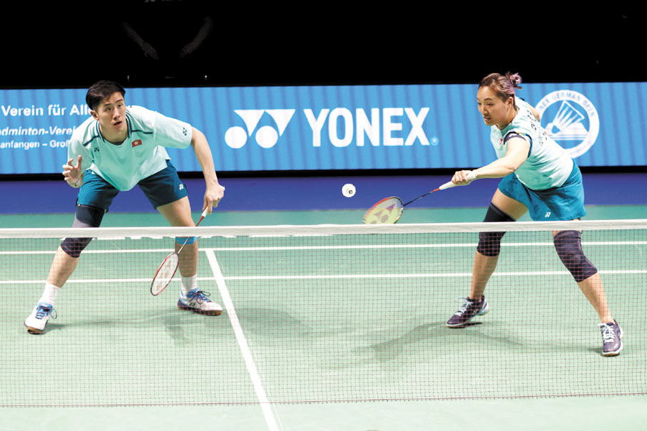 ◆鄧俊文（左）/謝影雪頂住壓力，最終獲勝。 Badminton Photo圖片