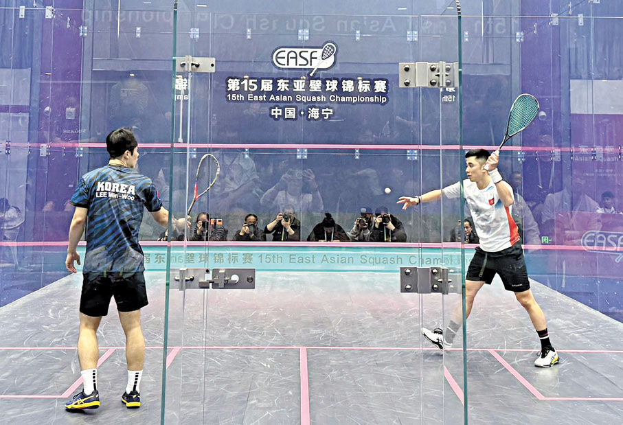 ◆鄧銘漮（右）力挫對手，為港隊奠勝。 壁總圖片