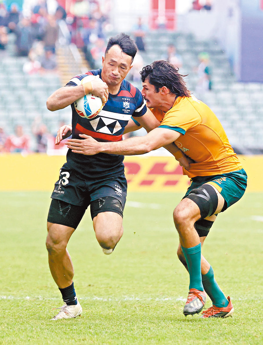 ◆姚錦成（左）在去年的香港「七欖」對抗澳洲隊。資料圖片