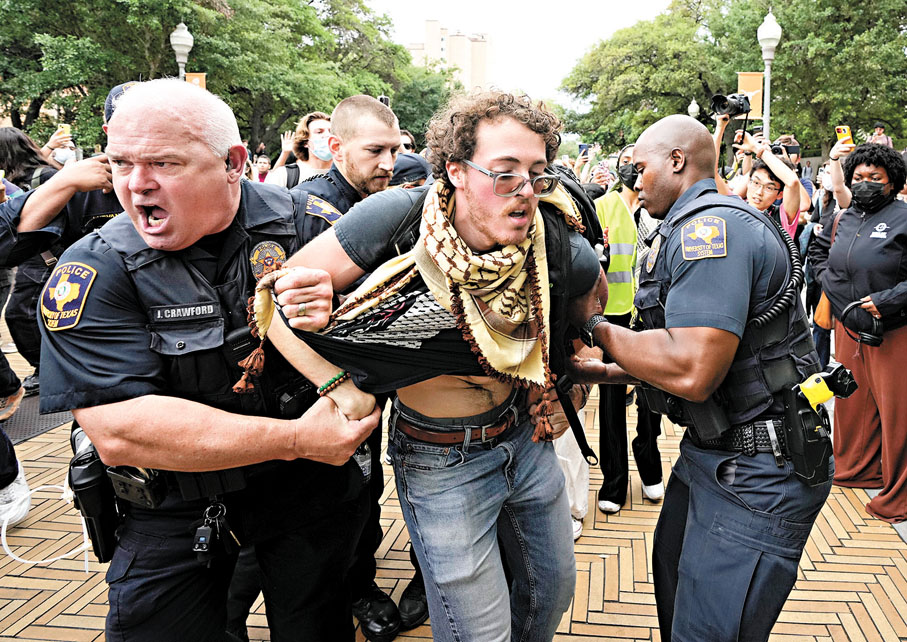 ◆警方粗暴地將抗議者帶走。 美聯社