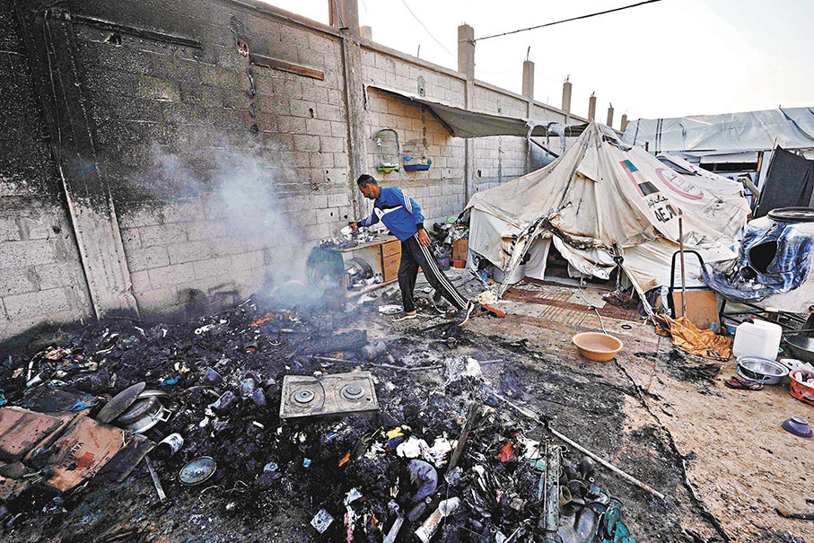 ◆以軍施襲接近人道建築範圍位置。 法新社