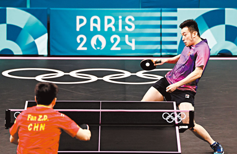 ◆黃鎮廷在比賽中。   新華社