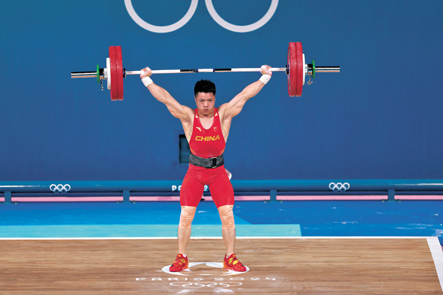 ◆李發彬在抓舉環節中成功舉起143公斤成績，刷新奧運紀錄。  新華社
