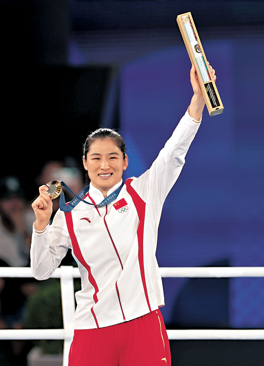 ◆李倩三戰奧運終圓金牌夢。 新華社