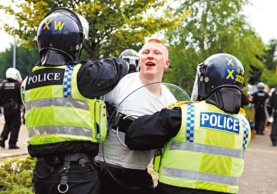 ◆英警利用街道監控、人臉識別等技術拘捕示威者。　　路透社