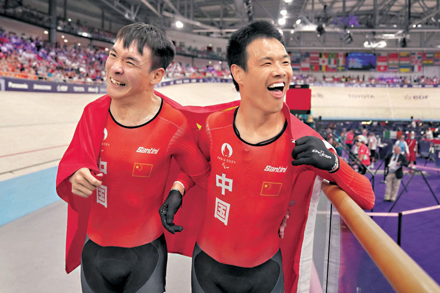 ◆李樟煜（右）和梁偉聰於賽後慶祝。  美聯社