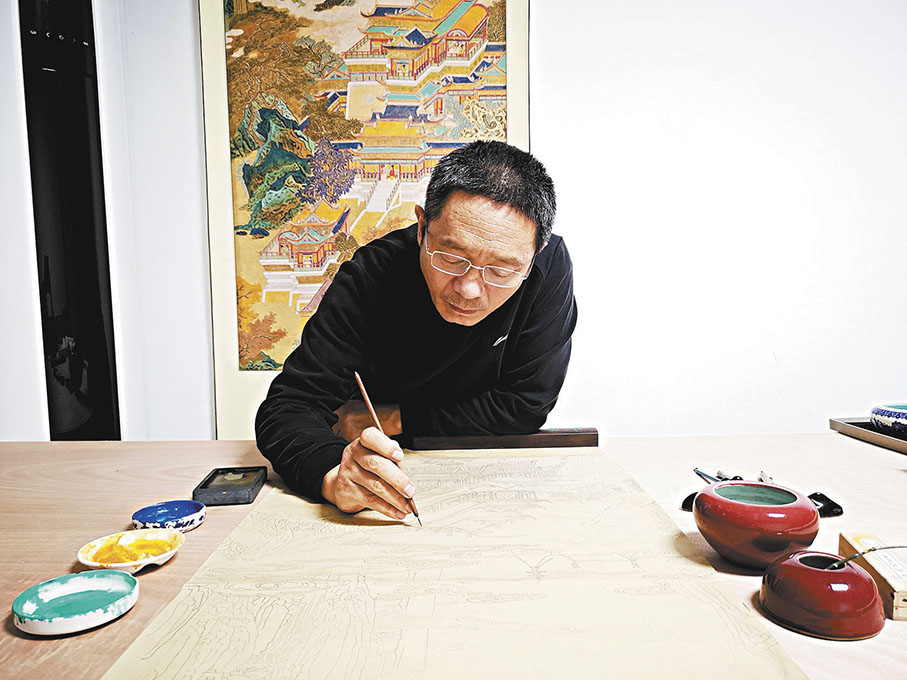 ●作畫時的王健。