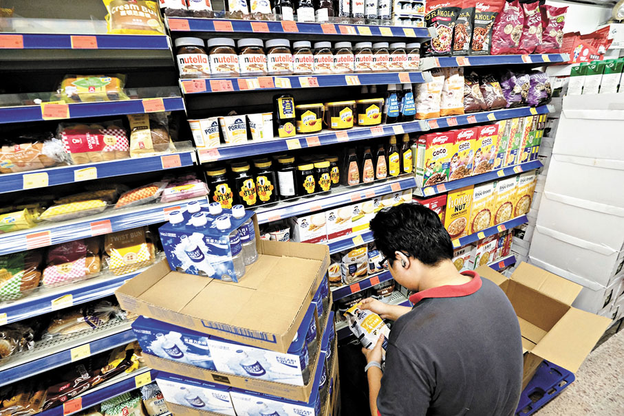 ●消委會蒐集60多件超市產品過去3年半數據，發現逾九成貨品容量或重量減少。香港文匯報記者涂穴  攝