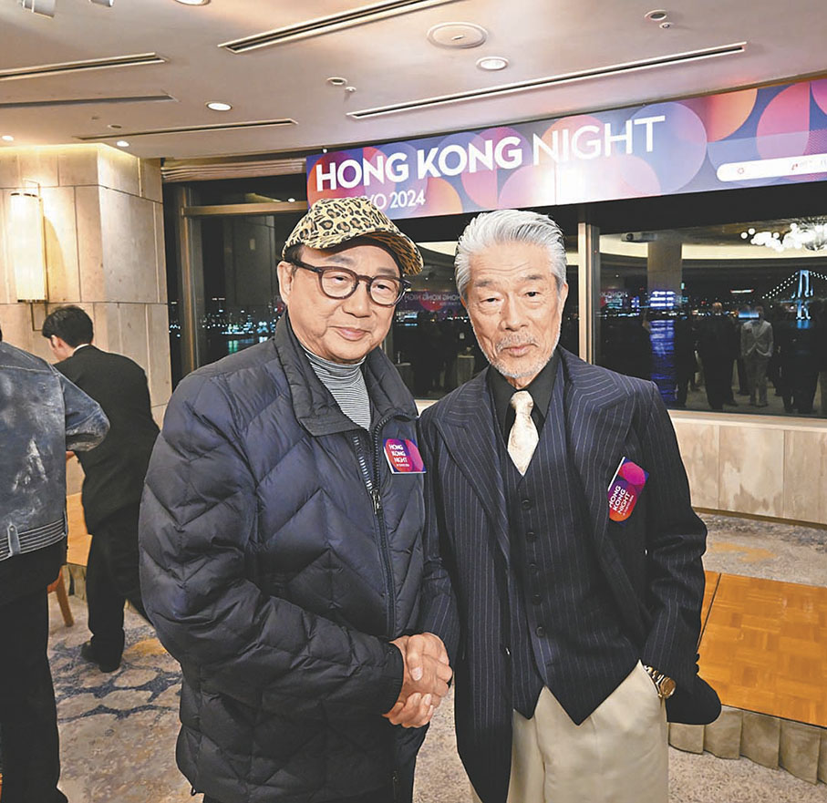 ●許冠文與倉田保昭相談甚歡。