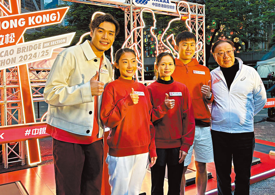 ●羅映潮（左二）表示今次半馬是寓賽於操。