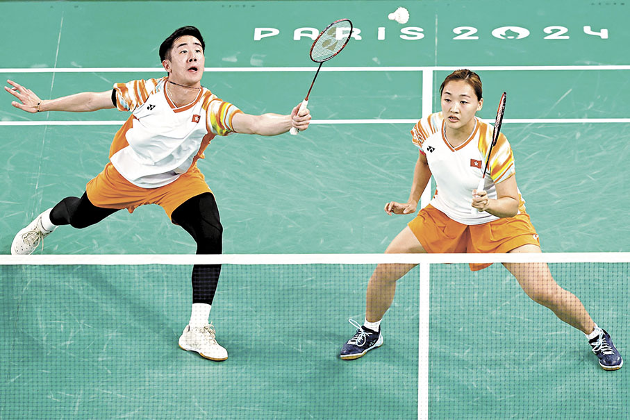 ●鄧俊文（左）和謝影雪最後一次合作出戰奧運。  資料圖片