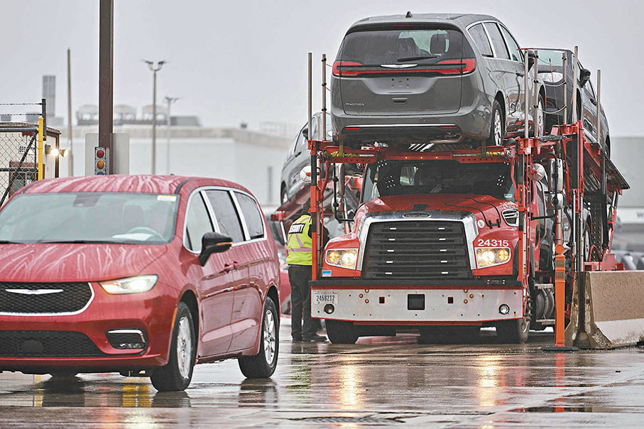 ●杜魯多承認加拿大面臨艱難時刻。圖為加國溫莎汽車組裝廠。 法新社