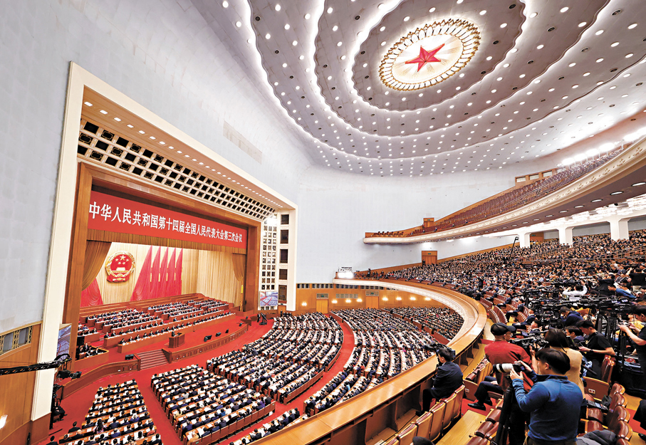 ●3月8日,十四屆全國人大三次會議在北京人民大會堂舉行第二次全體會議。 中新社