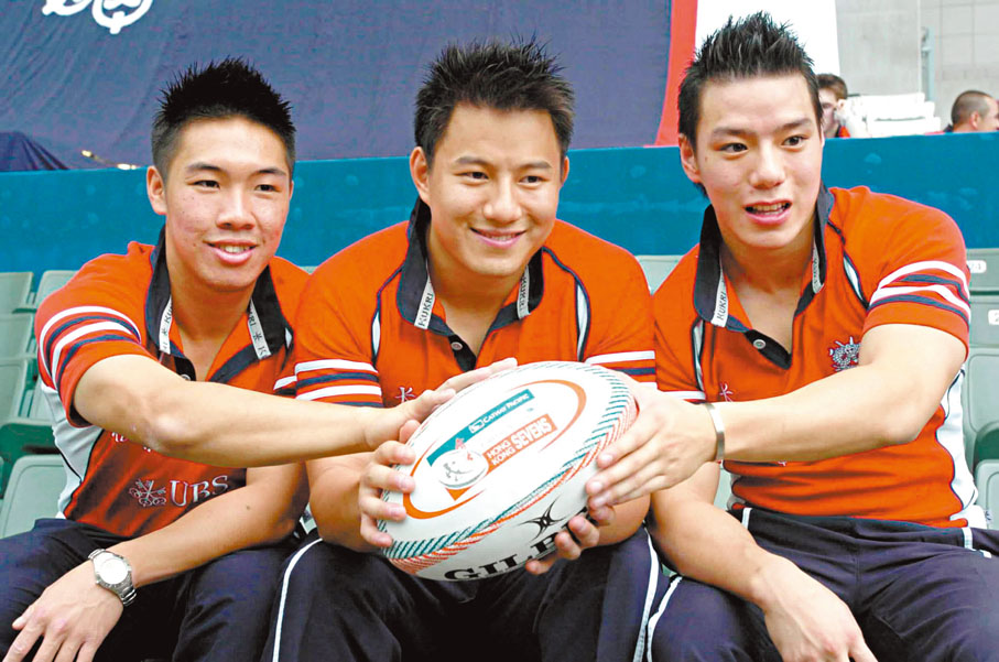 ●卓銘然（中）在役時叱咤風雲，是首位在七人欖球世界盃成功達陣的華人球員。   資料圖片