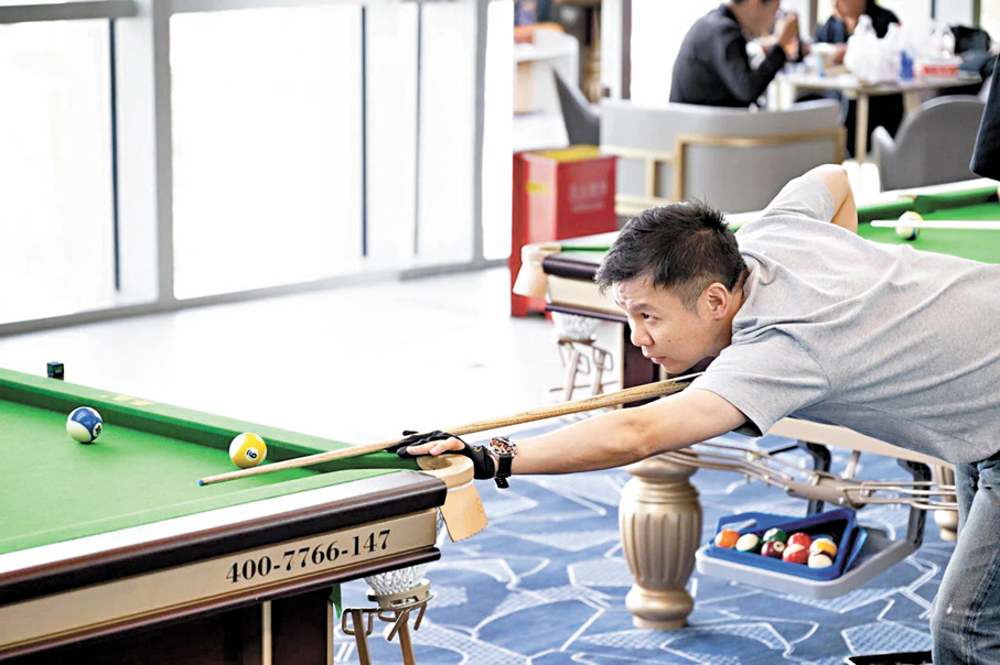 ●趙心童世錦賽奪冠帶動桌球產業升溫。圖為上海上月底一業餘桌球賽現場。 網上圖片