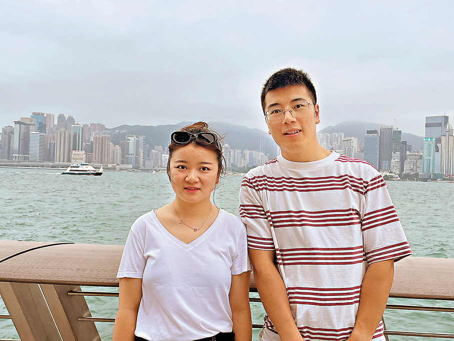 ●貴州遊客王先生夫婦。香港文匯報記者吳健怡  攝