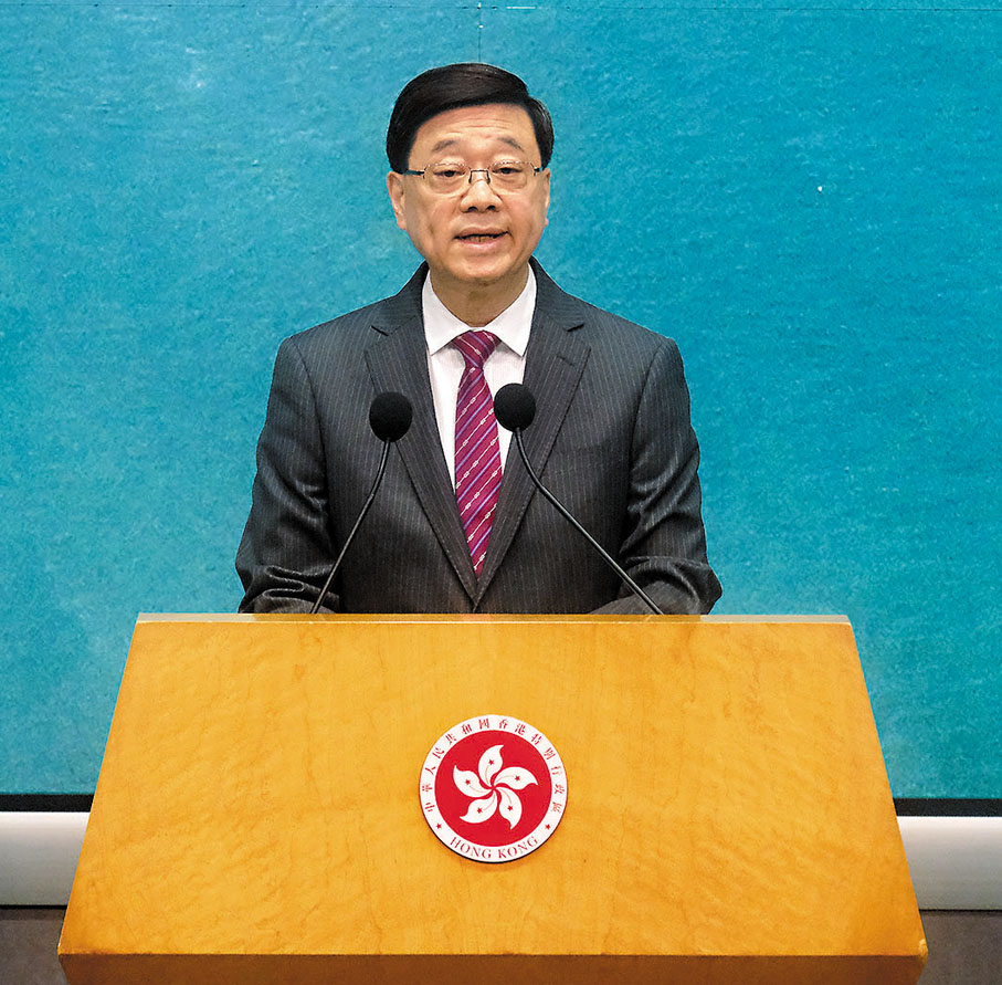 ●李家超說，對香港政府效率排名第二感鼓舞。 香港文匯報記者涂穴 攝