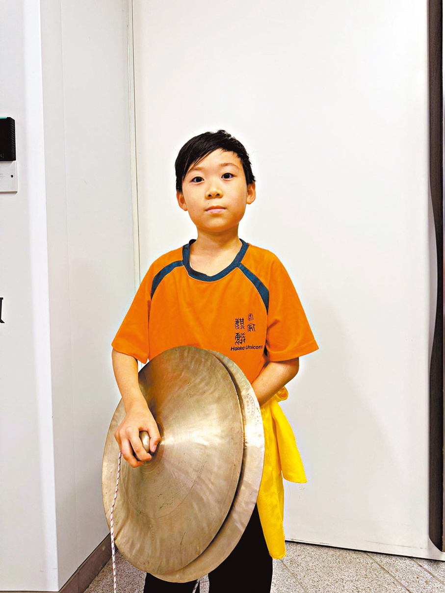 ●年僅8歲的小學員劉柏崎已經學習客家舞麒麟有三年之久。