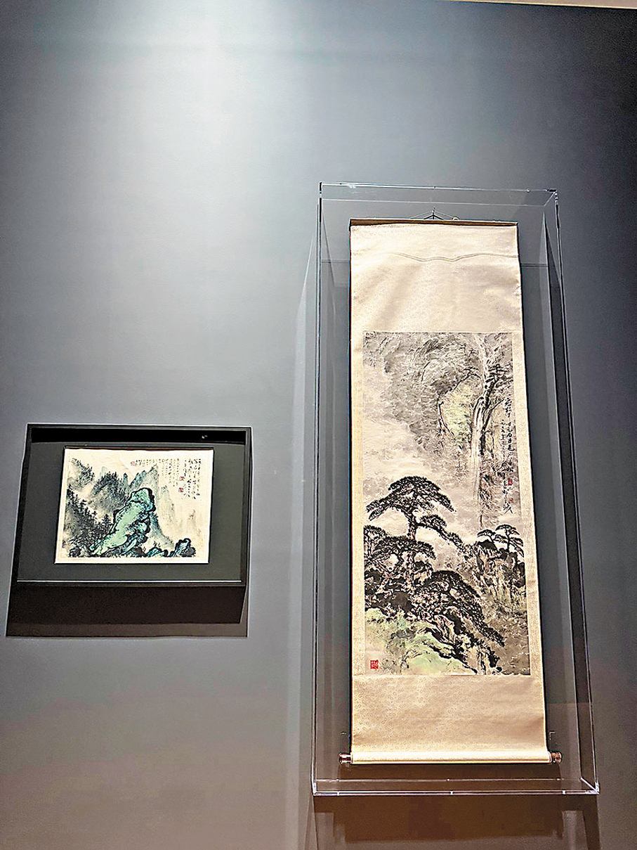 ●黎雄才《黃山》和關山月《松泉軸》(右)並列展出。