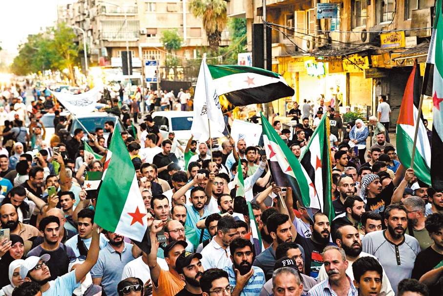 ●敘利亞大馬士革民眾抗議以色列施襲。 法新社