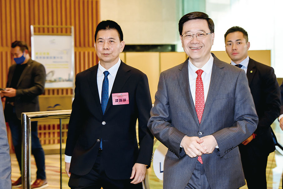 ●譚錦球、李家超。