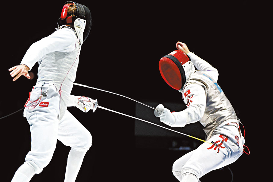 ●蔡俊彥（右）用耐性與信念刺出世界冠軍。 法新社